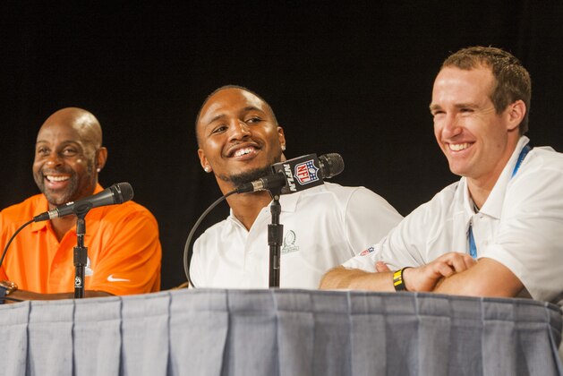 Pro Football Hall of Famer Jerry Rice, (L-R) Robert Quinn, defensive end for the St. Louis Rams, and Drew Brees, quarterback for the New Orleans Saints, answer questions at a news conference for the NFL Pro Bowl Draft, Tuesday, Jan. 21, 2014, Kapolei, Hawaii. (AP Photo/Marco Garcia) Pro Football Hall of Famer Jerry Rice, (L-R) Robert Quinn, defensive end for the St. Louis Rams, and Drew Brees, quarterback for the New Orleans Saints, answer questions at a news conference for the NFL Pro Bowl Draft, Tuesday, Jan. 21, 2014, Kapolei, Hawaii. (AP Photo/Marco Garcia)