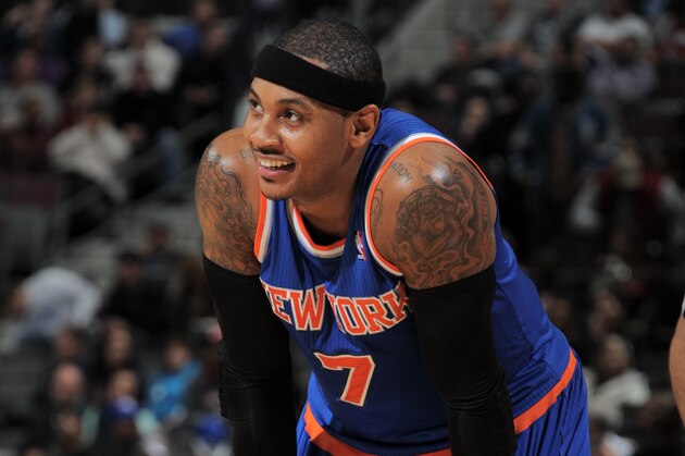AUBURN HILLS, MI - NOVEMBER 19: Carmelo Anthony #7 of the New York Knicks smiles during the game against the Detroit Pistons on November 19, 2013 at The Palace of Auburn Hills in Auburn Hills, Michigan. NOTE TO USER: User expressly acknowledges and agrees that, by downloading and/or using this photograph, User is consenting to the terms and conditions of the Getty Images License Agreement.  Mandatory Copyright Notice: Copyright 2013 NBAE (Photo by Allen Einstein/NBAE via Getty Images)
