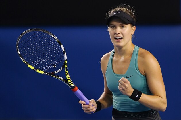 MELBOURNE, AUSTRALIA - JANUARY 19:  Eugenie Bouchard of Canada celebrates winning her fourth round singles match against Casey Dellacqua of Australia during day seven of the 2014 Australian Open at Melbourne Park on January 19, 2014 in Melbourne, Australia.  (Photo by Chris Hyde/Getty Images)