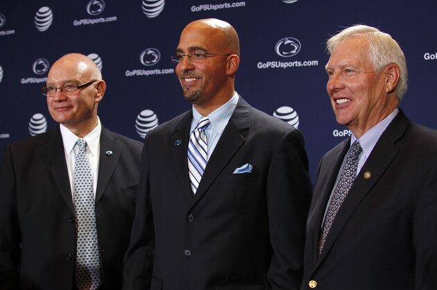 STATE COLLEGE, PA - JANUARY 11:  James Franklin, head coach of the Penn State Nittany Lions poses for a photo between Dave Joyner, Director of Athletics of The Pennsylvania State University (Left) and Rodney Erickson, President of The Pennsylvania State University on January 11, 2014 at Beaver Stadium in State College, Pennsylvania.  (Photo by Justin K. Aller/Getty Images)