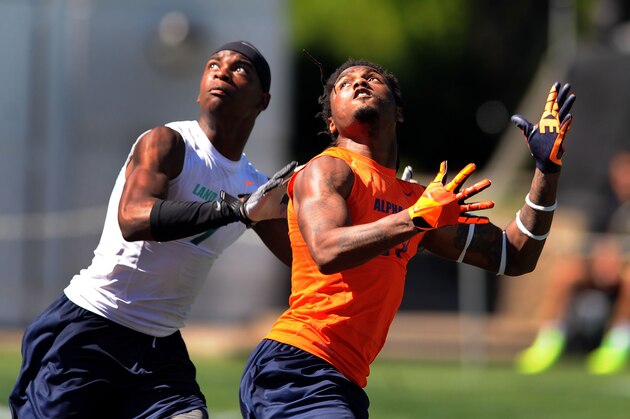 Jul 3, 2013; Beaverton, OR, USA; Montae Nicholson (7) closes in on wide receiver Ermon Lane (11) during the Nike 7on7 elimination play at Nike World Headquarters. Mandatory Credit: Steve Dykes-USA TODAY Sports