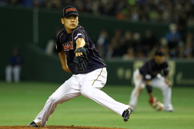 TOKYO, JAPAN - MARCH 08: Pitcher Masahiro Tanaka #17 of Japan pitches during the World Baseball Classic Second Round Pool 1 game between Japan and Chinese Taipei at Tokyo Dome on March 8, 2013 in Tokyo, Japan.  (Photo by Koji Watanabe/Getty Images)