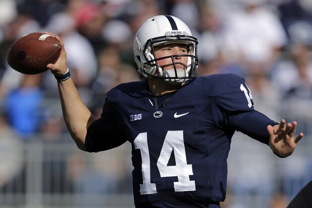 Penn State quarterback Christian Hackenberg (14) passes during the first quarter of an NCAA college football game against Purdue in State College, Pa., Saturday, Nov. 16, 2013. (AP Photo/Gene J Puskar)