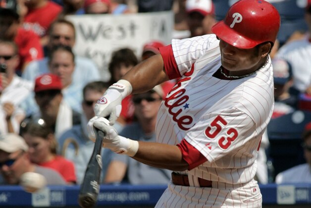 Philadelphia Phillies' Bobby Abreu singles against the Pittsburgh Pirates in the sixth inning of their baseball game Sunday, July 9, 2006, in Philadelphia. Abreu had three hits and reached base for the 34th straight game as the Phillies won 8-3, taking their first home series since May 29-31 against the Washington Nationals.(AP Photo/George Widman)