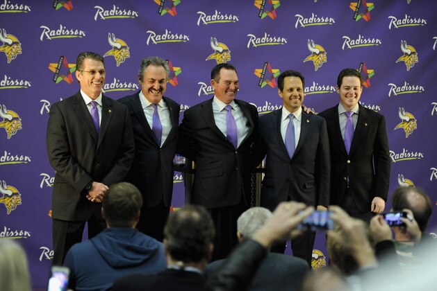 EDEN PRAIRIE, MN - JANUARY 17: (L-R) Rick Spielman, Zygi Wilf, Mike Zimmer, Mark Wilf and Jonathan Wilf of the Minnesota Vikings pose for photos as they introduce Zimmer as the new head coach on January 17, 2013 at Winter Park in Eden Prairie, Minnesota. (Photo by Hannah Foslien/Getty Images) EDEN PRAIRIE, MN - JANUARY 17: (L-R) Rick Spielman, Zygi Wilf, Mike Zimmer, Mark Wilf and Jonathan Wilf of the Minnesota Vikings pose for photos as they introduce Zimmer as the new head coach on January 17, 2013 at Winter Park in Eden Prairie, Minnesota. (Photo by Hannah Foslien/Getty Images)