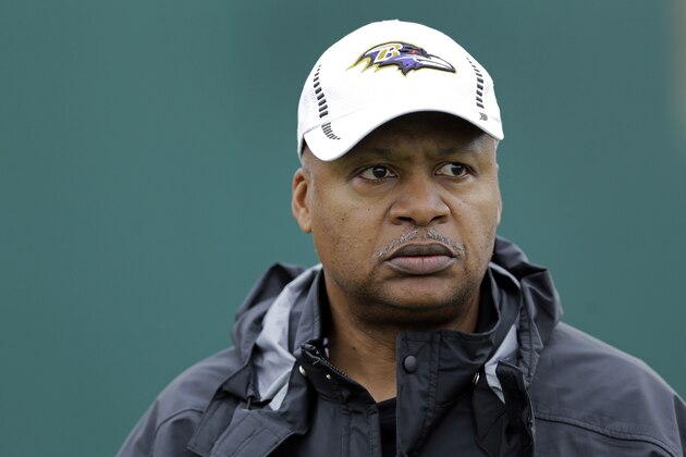 FILE - In this Jan. 30, 2013, file photo, Baltimore Ravens offensive coordinator Jim Caldwell walks onto the field as his team warms up during an NFL Super Bowl XLVII football practice in New Orleans. A person familiar with the situation says the Detroit Lions have hired coach Caldwell. (AP Photo/Patrick Semansky, File)