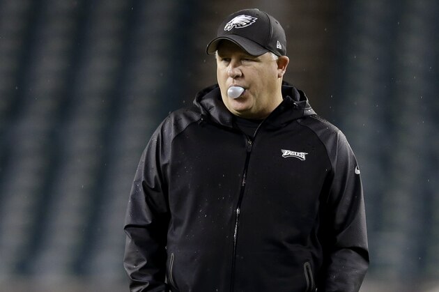 Philadelphia Eagles head coach Chip Kelly blows a bubble during warm ups before the first half of an NFL football game, between the Philadelphia Eagles and the Chicago Bears, Sunday, Dec. 22, 2013, in Philadelphia. (AP Photo/Michael Perez)