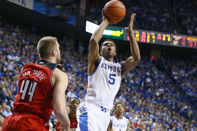 LEXINGTON, KY - DECEMBER 28:  Andrew Harrison #5 of the Kentucky Wildcats shoots the ball during 73-66 win over the Louisville Cardinals at Rupp Arena on December 28, 2013 in Lexington, Kentucky.  (Photo by Andy Lyons/Getty Images)