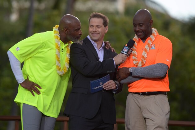 Jan 22, 2014; Ko'Olina, HI, USA; Chris Rose (center) interviews Deion Sanders (left) and Jerry Rice at the Pro Bowl draft at the J.W. Marriott Ihilani Resort & Spa. Mandatory Credit: Kirby Lee-USA TODAY Sports
