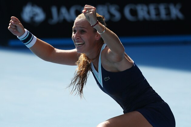 MELBOURNE, AUSTRALIA - JANUARY 23:  Dominika Cibulkova of Slovakia celebrates winning her semifinal match against Agnieszka Radwanska of Poland during day 11 of the 2014 Australian Open at Melbourne Park on January 23, 2014 in Melbourne, Australia.  (Photo by Mark Kolbe/Getty Images)