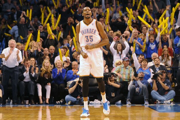 Jan 17, 2014; Oklahoma City, OK, USA; Oklahoma City Thunder small forward Kevin Durant (35) reacts to a play in action against the Golden State Warriors during the fourth quarter at Chesapeake Energy Arena. Mandatory Credit: Mark D. Smith-USA TODAY Sports