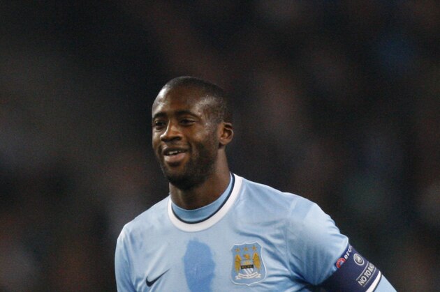 Manchester City's Yaya Toure smiles during his team's Champions League Group D soccer match against CSKA Moscow at the Etihad Stadium, Manchester, England, Tuesday Nov. 5, 2013. (AP Photo/Jon Super)