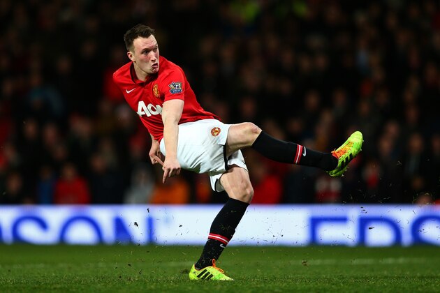 MANCHESTER, ENGLAND - JANUARY 22:  Phil Jones of Manchester United misses with his penalty attempt during the Capital One Cup semi final, second leg match between Manchester United and Sunderland at Old Trafford on January 22, 2014 in Manchester, England.  (Photo by Clive Mason/Getty Images)