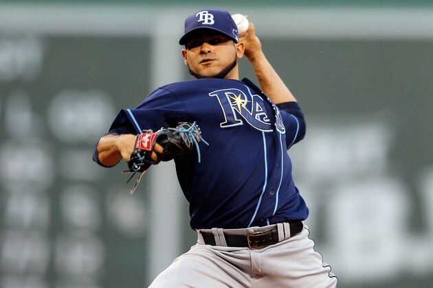 BOSTON, MA - OCTOBER 04:  Alex Torres #54 of the Tampa Bay Rays pitches against the Boston Red Sox during Game One of the American League Division Series at Fenway Park on October 4, 2013 in Boston, Massachusetts.  (Photo by Jim Rogash/Getty Images)