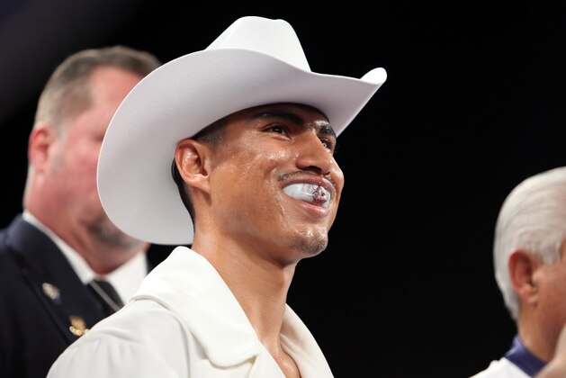 Miguel Angel Garcia is seen before his fight against WBO Featherweight Champion Orlando Salido at the Theater at Madison Square Garden on Saturday, January 19, 2013 in New York City. Garcia won the title via Technical Decision in the 8th round after an accidental head butt broke his nose. Garcia was declared the winner on the scorecards. (AP Photo/Gregory Payan) Miguel Angel Garcia is seen before his fight against WBO Featherweight Champion Orlando Salido at the Theater at Madison Square Garden on Saturday, January 19, 2013 in New York City. Garcia won the title via Technical Decision in the 8th round after an accidental head butt broke his nose. Garcia was declared the winner on the scorecards. (AP Photo/Gregory Payan)