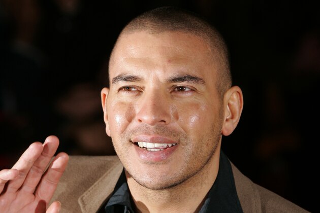 Cast member and former Liverpool soccer player Stan Collymore arrives for the World Premiere of the film 'Basic Instinct  2' at the Vue Cinema in Leicester Square, London, Wednesday March 15, 2006.  (AP Photo/Matt Dunham)