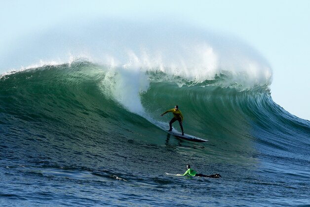 HALF MOON BAY, CA - JANUARY 20:  Alex Martins competes in the finals during the Mavericks Invitational surf competition on January 20, 2013 in Half Moon Bay, California.  (Photo by Ezra Shaw/Getty Images)