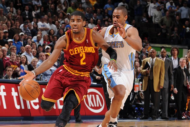 DENVER, CO - MARCH 7:  Kyrie Irving #2 of the Cleveland Cavaliers drives to the basket against Arron Afflalo #6 of the Denver Nuggets during the game on March 7, 2012 at the Pepsi Center in Denver, Colorado. NOTE TO USER: User expressly acknowledges and agrees that, by downloading and/or using this Photograph, user is consenting to the terms and conditions of the Getty Images License Agreement. Mandatory Copyright Notice: Copyright 2012 NBAE (Photo by Garrett W. Ellwood/NBAE via Getty Images)