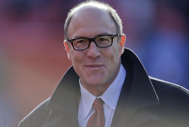 Kansas City Chiefs General Manager Scott Pioli watches as the Chiefs warm up before an NFL football game against the Denver Broncos, Sunday, Dec. 30, 2012, in Denver. (AP Photo/Joe Mahoney)