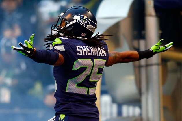 SEATTLE, WA - JANUARY 19:  Cornerback Richard Sherman #25 of the Seattle Seahawks takes the field for the 2014 NFC Championship against the San Francisco 49ers at CenturyLink Field on January 19, 2014 in Seattle, Washington.  (Photo by Jonathan Ferrey/Getty Images)