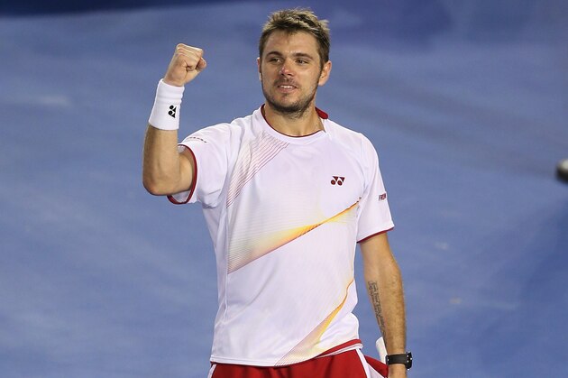MELBOURNE, AUSTRALIA - JANUARY 23:  Stanislas Wawrinka of Switzerland celebrates after his four set victory in his semifinal match against Tomas Berdych of the Czech Republic during day 11 of the 2014 Australian Open at Melbourne Park on January 23, 2014 in Melbourne, Australia.  (Photo by Clive Brunskill/Getty Images)