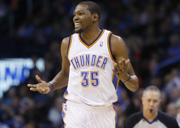 Oklahoma City Thunder forward Kevin Durant (35) gestures and smiles after hitting a basket in the second quarter of an NBA basketball game against the Portland Trail Blazers in Oklahoma City, Tuesday, Jan. 21, 2014. (AP Photo/Sue Ogrocki)