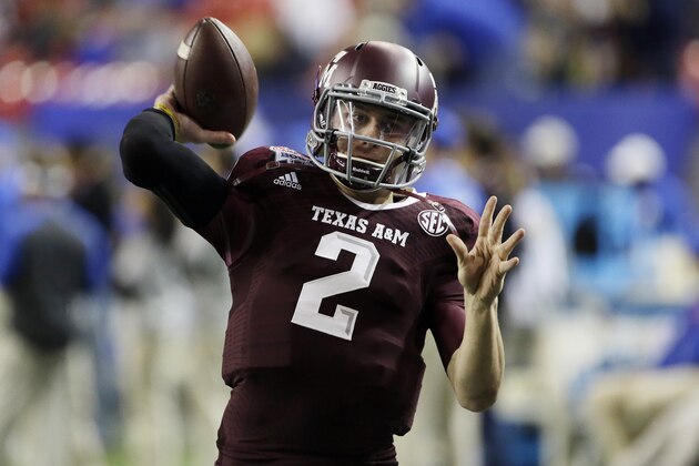 Texas A&M quarterback Johnny Manziel (2) warms up before the start of the Chick-fil-A Bowl NCAA college football game against Duke Tuesday, Dec. 31, 2013, in Atlanta. (AP Photo/John Bazemore)