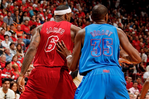 MIAMI, FL - DECEMBER 25: Kevin Durant #35 of the Oklahoma City Thunder guards LeBron James #6 of the Miami Heat during a Christmas Day game on December 25, 2012 at American Airlines Arena in Miami, Florida. NOTE TO USER: User expressly acknowledges and agrees that, by downloading and/or using this photograph, user is consenting to the terms and conditions of the Getty Images License Agreement. Mandatory copyright notice: Copyright NBAE 2012 (Photo by Issac Baldizon/NBAE via Getty Images)