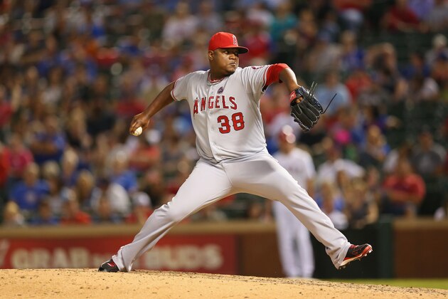 ARLINGTON, TX - SEPTEMBER 26:  J.C. Gutierrez #38 of the Los Angeles Angels throws against the Texas Rangers in the 7th inning at Rangers Ballpark in Arlington on September 26, 2013 in Arlington, Texas.  (Photo by Ronald Martinez/Getty Images)