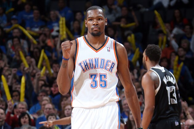 OKLAHOMA CITY, OK - JANUARY 19:  Kevin Durant #35 of the Oklahoma City Thunder celebrates after a play during an NBA game on January 19, 2014 at the Chesapeake Energy Arena in Oklahoma City, Oklahoma. NOTE TO USER: User expressly acknowledges and agrees that, by downloading and or using this Photograph, user is consenting to the terms and conditions of the Getty Images License Agreement. Mandatory Copyright Notice: Copyright 2014 NBAE (Photo by Layne Murdoch/NBAE via Getty Images)