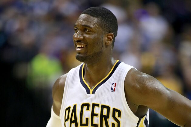 Indiana Pacers center Roy Hibbert smiles in the second half of an NBA basketball game against the New Orleans Pelicans in Indianapolis, Saturday, Jan. 4, 2014. (AP Photo/R Brent Smith)
