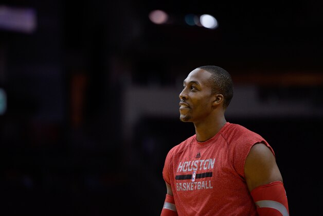 Oct 16, 2013; Houston, TX, USA; Houston Rockets center Dwight Howard (12) warms up against the Orlando Magic during the first half at Toyota Center. Mandatory Credit: Thomas Campbell-USA TODAY Sports