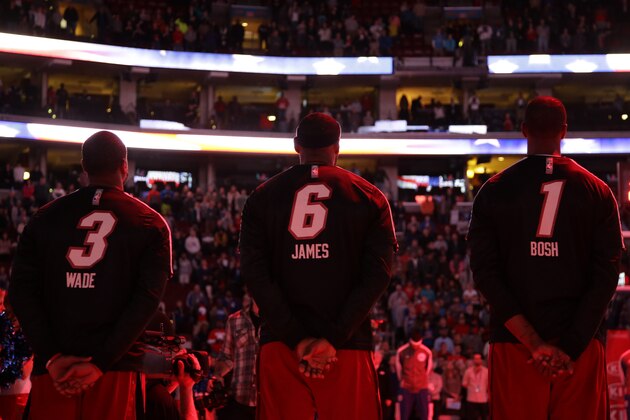 Miami Heat's Dwyane Wade, from left, LeBron James and Chris Bosh line up before an NBA basketball game against the Philadelphia 76ers, Friday, Jan. 17, 2014, in Philadelphia. (AP Photo/Matt Slocum)