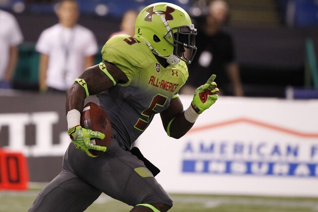 Jan 2, 2014; St. Petersburg, FL, USA; Team Nitro cornerback Jabrill Peppers (5) runs with the ball during a punt during the second half at Tropicana Field. Team Highlight defeated the Team Nitro 31-21. Mandatory Credit: Kim Klement-USA TODAY Sports
