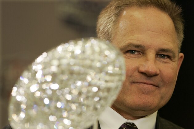 LSU head coach Les Miles poses with the BCS championship trophy during a news conference in New Orleans, Sunday, Jan. 6, 2008. LSU will play Ohio State in the BCS championship college football game on Jan. 7, 2008. (AP Photo/Charlie Riedel) LSU head coach Les Miles poses with the BCS championship trophy during a news conference in New Orleans, Sunday, Jan. 6, 2008. LSU will play Ohio State in the BCS championship college football game on Jan. 7, 2008. (AP Photo/Charlie Riedel)