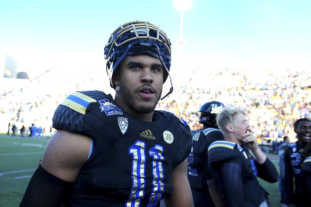 Dec 31, 2013; El Paso, TX, USA; UCLA Bruins linebacker Anthony Barr (11) walks off the field after winning the 2013 Sun Bowl at Sun Bowl Stadium. UCLA defeated Virginia Tech 42-12. Mandatory Credit: Andrew Weber-USA TODAY Sports