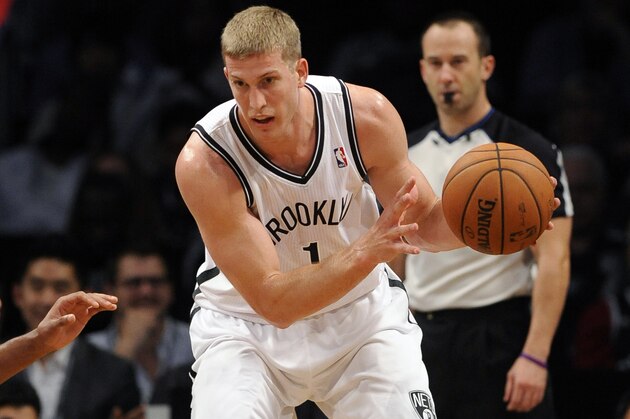 Brooklyn Nets' Mason Plumlee (1) looks to pass against the Detroit Pistons during a preseason NBA basketball game on Saturday, Oct. 12, 2013, in New York. (AP Photo/Kathy Kmonicek)