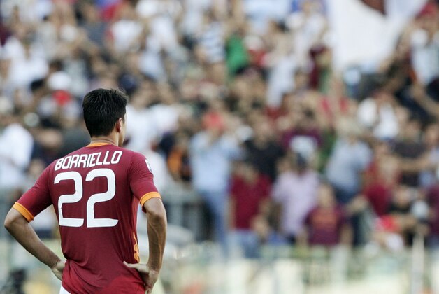 AS Roma forward Marco Borriello reacts after Cagliari forward Mostapha El Kabir, of Morocco, not seen, scored during a Serie A soccer match between AS Roma and Cagliari, at Rome's Olympic stadium, Sunday, Sept. 11, 2011. Cagliari won 2-1. (AP Photo/Riccardo De Luca)