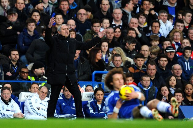 LONDON, ENGLAND - JANUARY 19:  Jose Mourinho the Chelsea manager reacts during the Barclays Premier League match between Chelsea and Manchester United at Stamford Bridge on January 19, 2014 in London, England.  (Photo by Mike Hewitt/Getty Images)