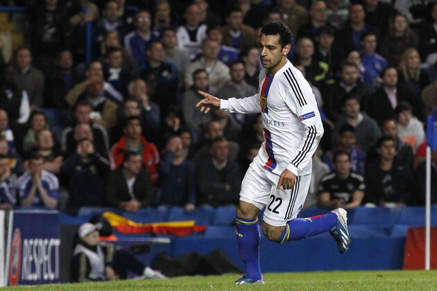 Basel's Mohamed Salah celebrates after scoring a goal against Chelsea during their Europa League semifinal second leg soccer match, at Chelsea's Stamford Bridge stadium in London, Thursday, May  2, 2013. (AP Photo/Sang Tan)