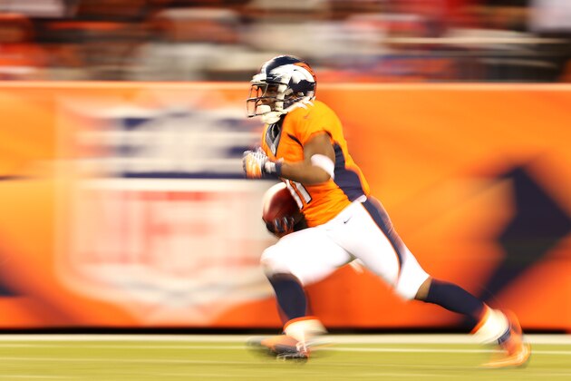 DENVER, CO - JANUARY 12:   Trindon Holliday #11 of the Denver Broncos carries the ball during the AFC Divisional Playoff Game against the San Diego Chargers  at Sports Authority Field at Mile High on January 12, 2014 in Denver, Colorado.  (Photo by Christian Petersen/Getty Images)