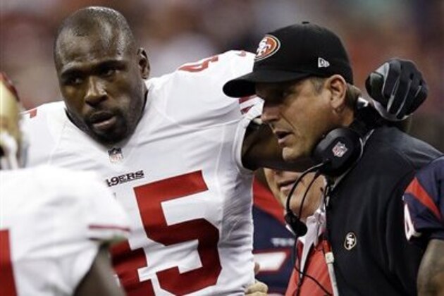 FILE - In this Aug. 18, 2012, file photo, San Francisco 49ers' Brandon Jacobs (46) is helped off by coach Jim Harbaugh in the first quarter of an NFL preseason football game against the Houston Texans in Houston. What at first looked like at least one _ if not two _ long-term injuries for San Francisco's newest running backs in Saturday's 20-9 preseason loss at the Houston Texans suddenly doesn't seem so bad. (AP Photo/David J. Phillip, File)