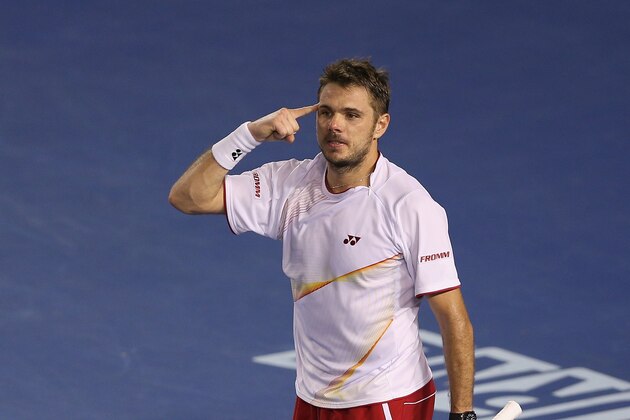MELBOURNE, AUSTRALIA - JANUARY 23:  Stanislas Wawrinka of Switzerland celebrates match point in his semifinal match against Tomas Berdych of the Czech Republic during day 11 of the 2014 Australian Open at Melbourne Park on January 23, 2014 in Melbourne, Australia.  (Photo by Clive Brunskill/Getty Images)