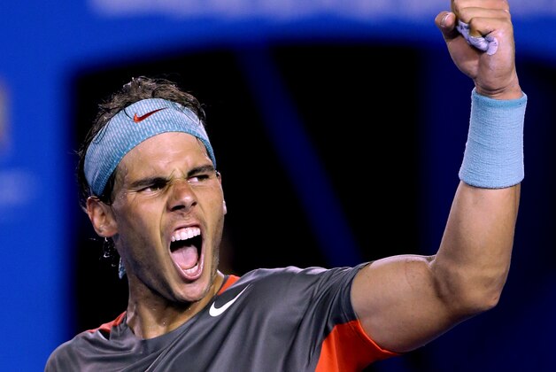 Rafael Nadal of Spain celebrates after defeating Roger Federer of Switzerland during their semifinal at the Australian Open tennis championship in Melbourne, Australia, Friday, Jan. 24, 2014.(AP Photo/Aaron Favila) Rafael Nadal of Spain celebrates after defeating Roger Federer of Switzerland during their semifinal at the Australian Open tennis championship in Melbourne, Australia, Friday, Jan. 24, 2014.(AP Photo/Aaron Favila)