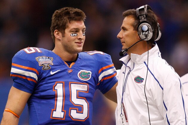 NEW ORLEANS - JANUARY 01:  Quarterback Tim Tebow #15  hugs head coach Urban Meyer of the Florida Gators after scoring a touchdown against the Cincinnati Bearcats during the Allstate Sugar Bowl at the Louisana Superdome on January 1, 2010 in New Orleans, Louisiana.  (Photo by Chris Graythen/Getty Images)