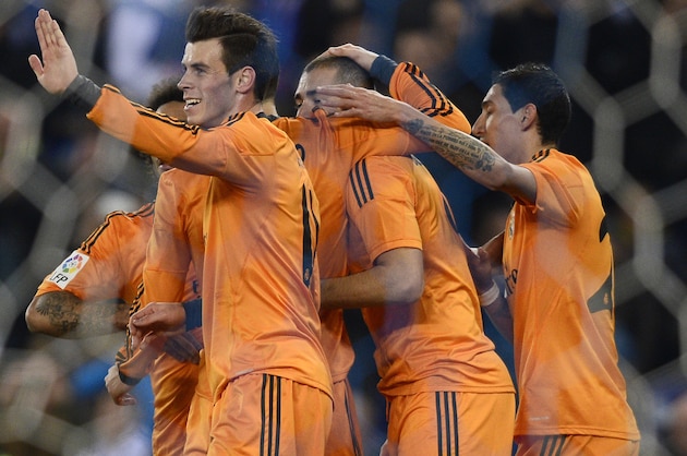Real Madrid Gareth Bale, left, celebrates a goal with his teammates against Espanyol during a Copa del Rey soccer match at Cornella-El Prat stadium in Cornella Llobregat , Spain, Tuesday, Jan. 21, 2014. (AP Photo/Manu Fernandez) Real Madrid Gareth Bale, left, celebrates a goal with his teammates against Espanyol during a Copa del Rey soccer match at Cornella-El Prat stadium in Cornella Llobregat , Spain, Tuesday, Jan. 21, 2014. (AP Photo/Manu Fernandez)