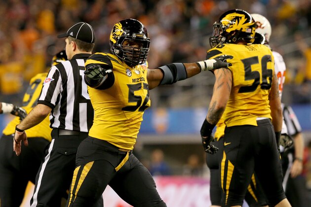 ARLINGTON, TX - JANUARY 03:  Michael Sam #52 of the Missouri Tigers reacts after Ben Grogan #19 of the Oklahoma State Cowboys misses a 34-yard field goal in the second quarter during the AT&T Cotton Bowl on January 3, 2014 in Arlington, Texas.  (Photo by Ronald Martinez/Getty Images)