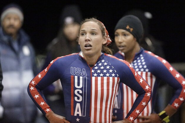 FILE - In this Oct. 25, 2013, photo, Jazmine Fenlator, right, and Lolo Jones look up after coming to a stop after racing in the U.S. women's bobsled team Olympic trials in Park City, Utah. The U.S. Bobsled and Skeleton Federation is defending Jones' selection to the team picked to compete in the Sochi Olympics, saying it relied on data, results and nothing else. Jones is one of three athletes picked to push sleds in Sochi. She was named to the team Sunday night, Jan. 19. The federation has gotten a number of complaints since suggesting that it chose Jones because of her popularity. (AP Photo/Rick Bowmer, File)