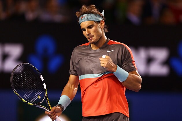 MELBOURNE, AUSTRALIA - JANUARY 24:  Rafael Nadal of Spain celebrates a break in serve in his semifinal match against Roger Federer of Switzerland during day 12 of the 2014 Australian Open at Melbourne Park on January 24, 2014 in Melbourne, Australia.  (Photo by Matt King/Getty Images)
