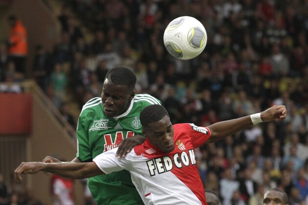 Monaco's Geoffrey Kondogbia, front, challenges for the ball with Saint Etienne's Kurt Zouma during their French League One soccer match at the Monaco stadium, Monaco, Saturday, Oct. 5, 2013. (AP Photo/Lionel Cironneau)